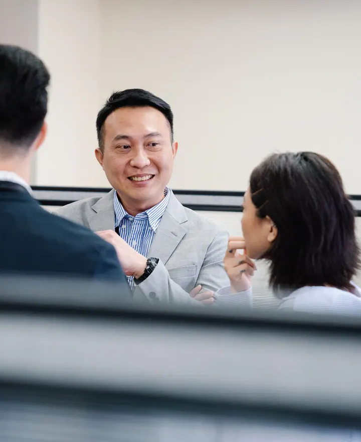 Professionals exchanging ideas in a collaborative meeting