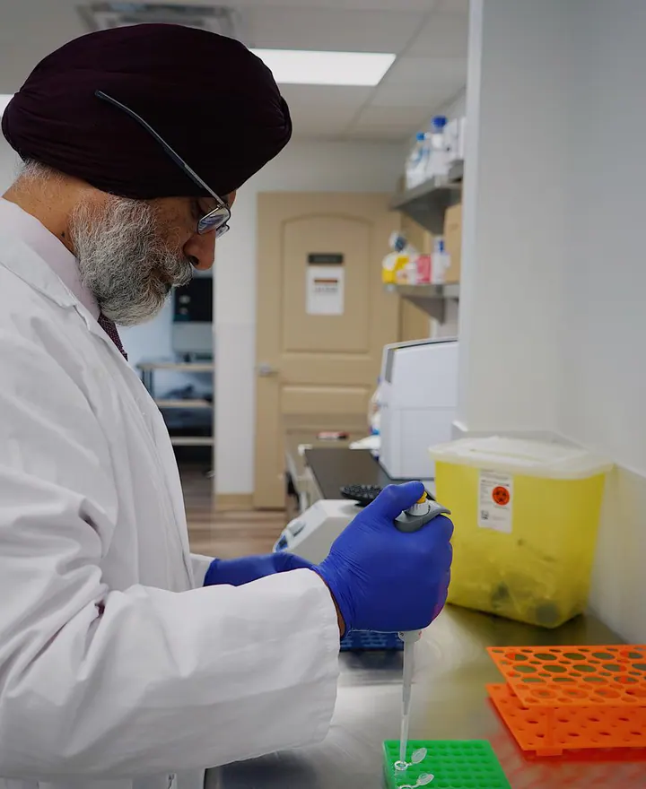 An Indian research expert conducting laboratory work